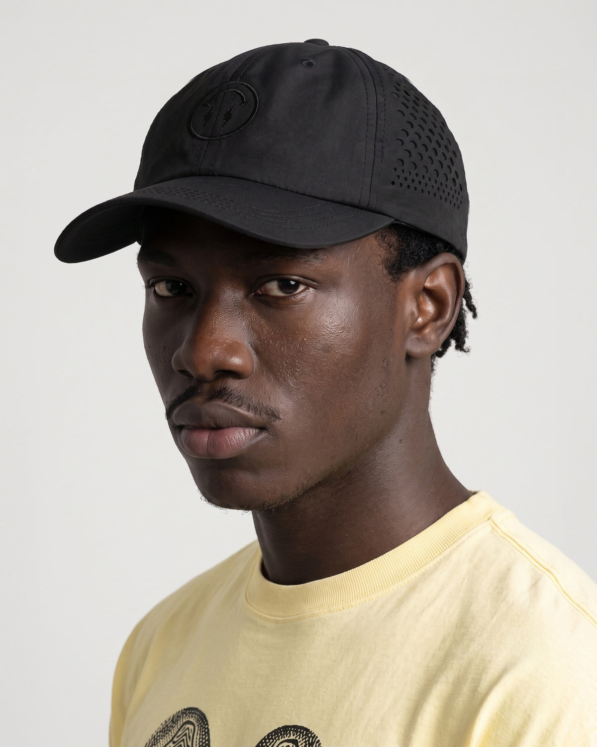 J BALVIN LASER CUT 6 PANEL CAP BLACK
