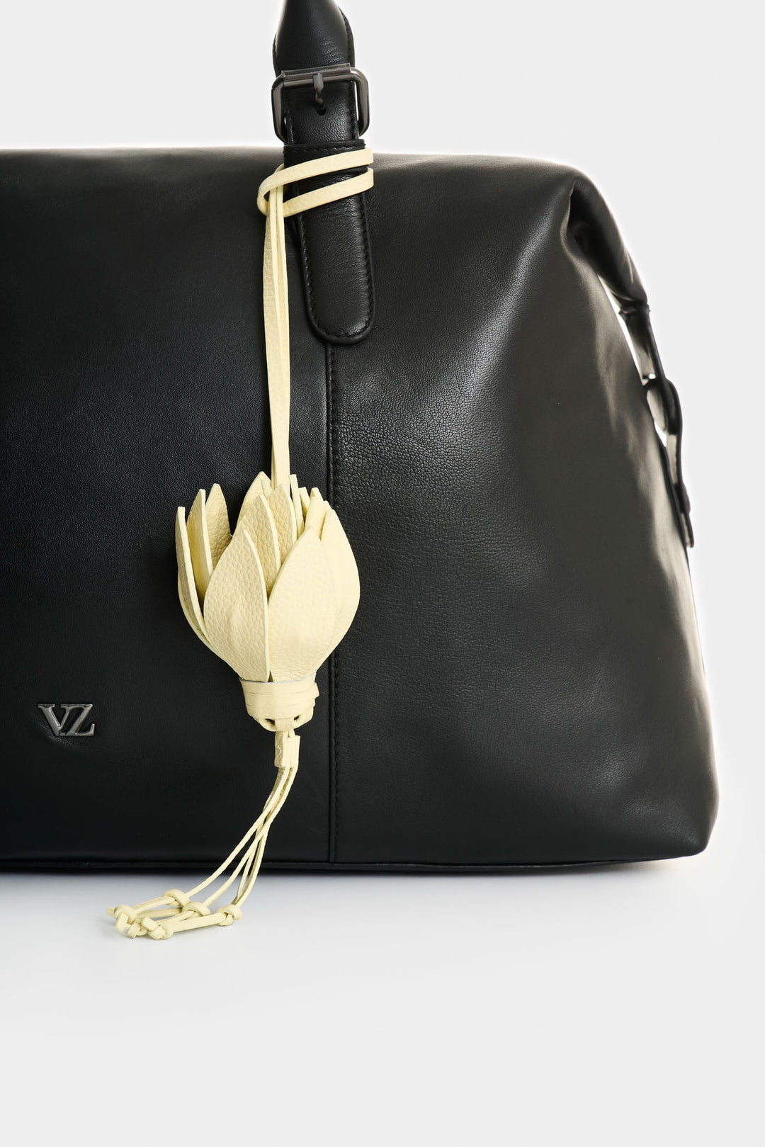 LEATHER FLOWER CHARM